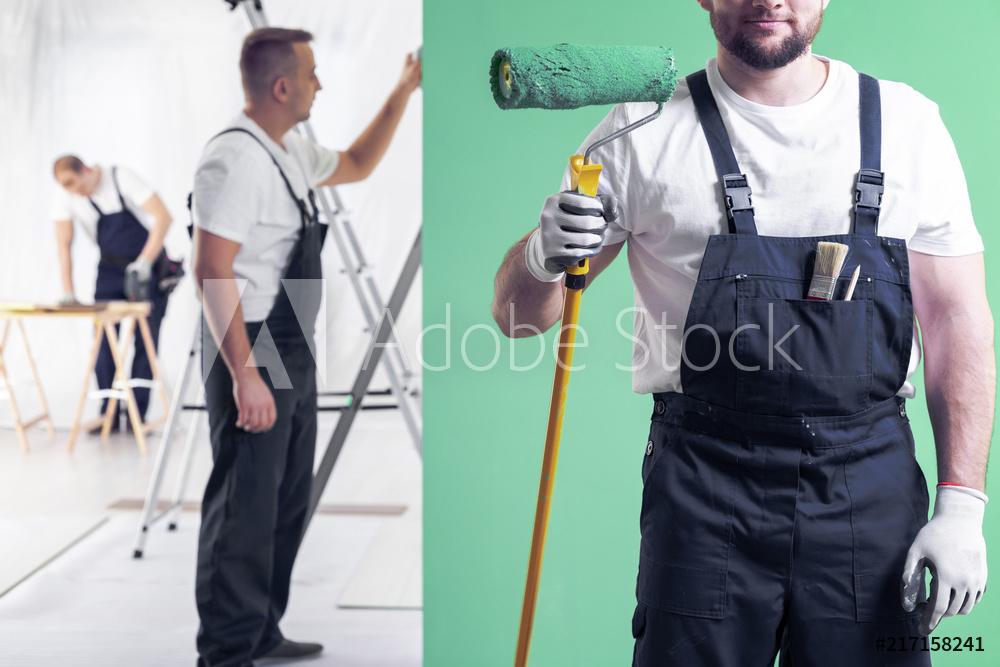 Worker with hammer photo